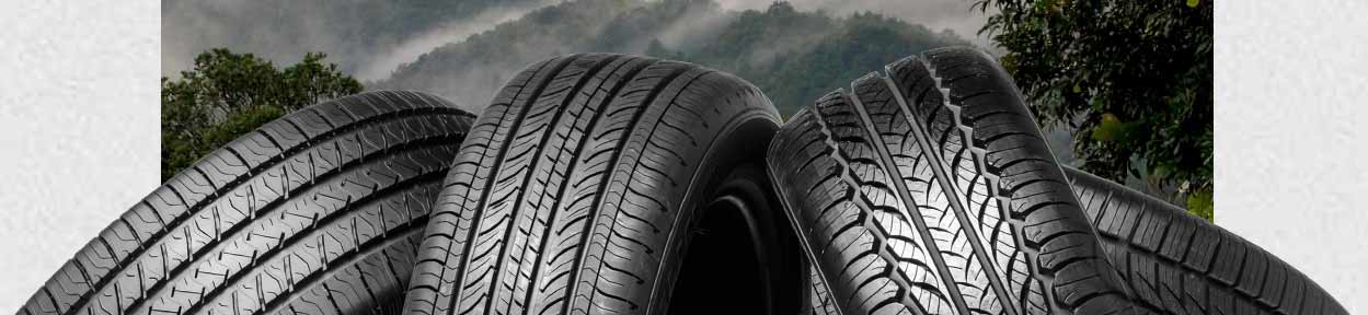 Tire Pile in front of Scenic Background